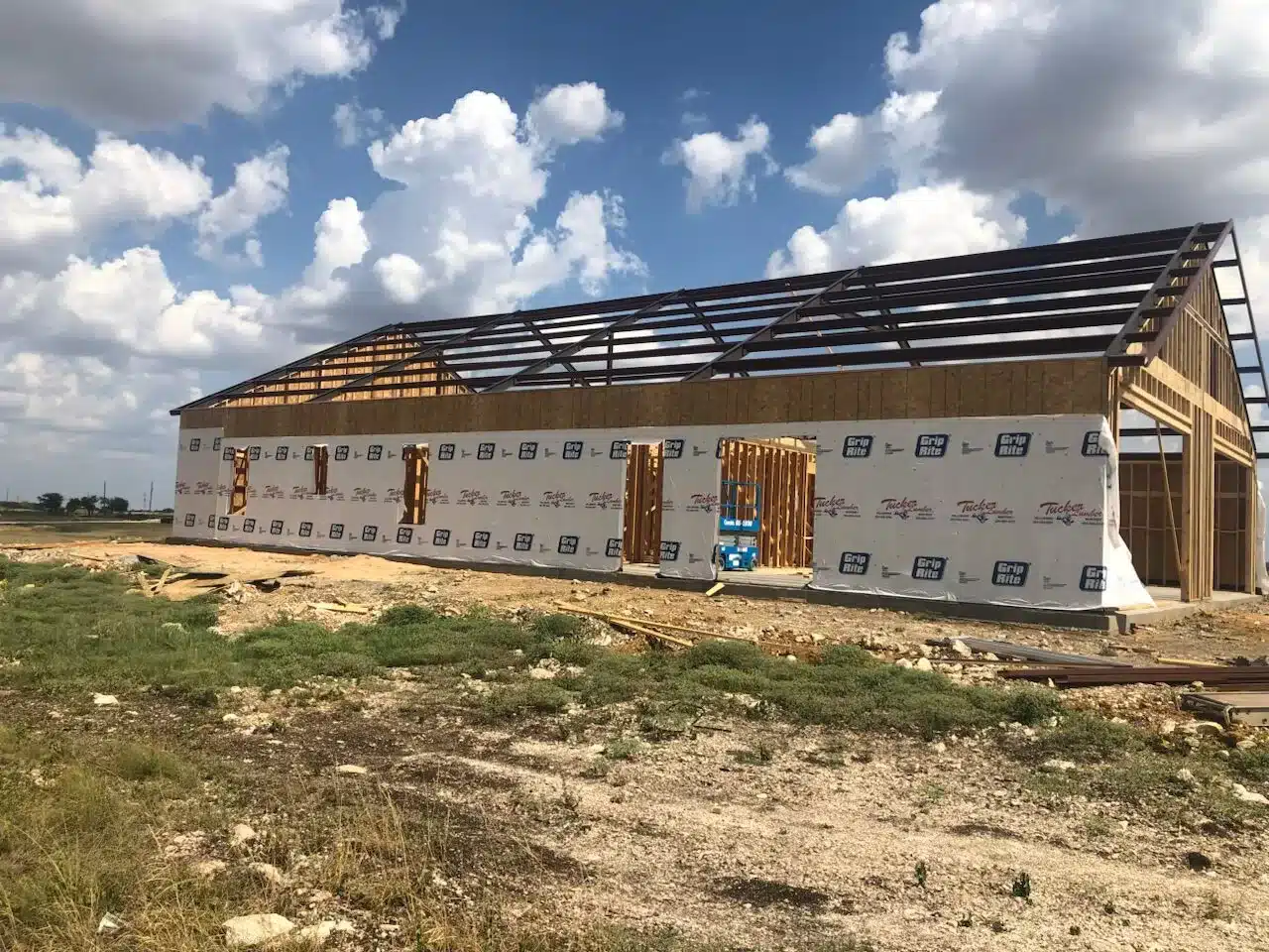 barndominium foundation built in Oklahoma, expecting metals to arrive to start constructing the roof.